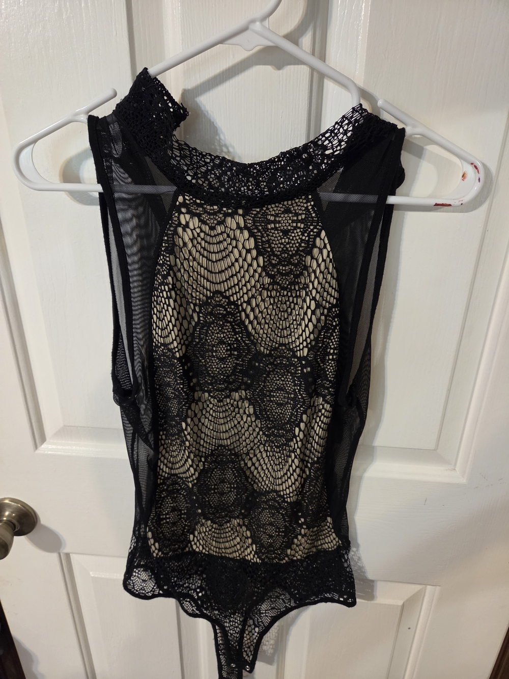 Sleeveless Black Lace Overlay Bodysuit with Nude Lining